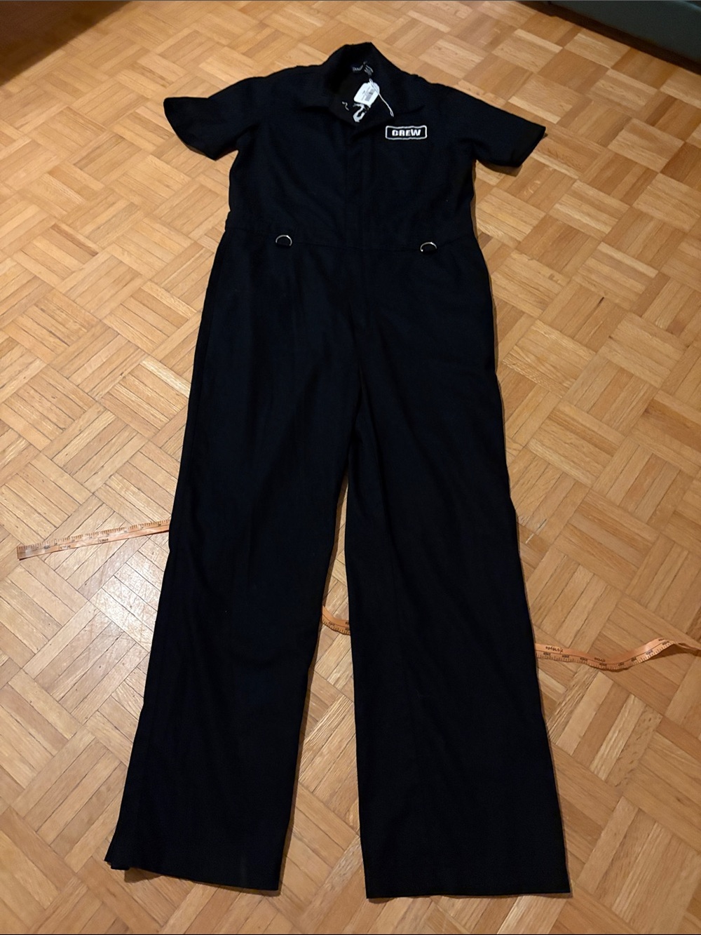 Dolls Kill Black Short-Sleeve Jumpsuit with Patch Logo